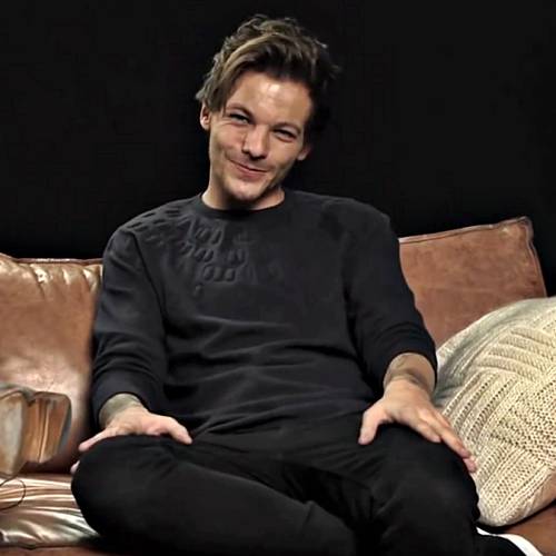Louis Tomlinson felt pressure to match One Direction bandmates success