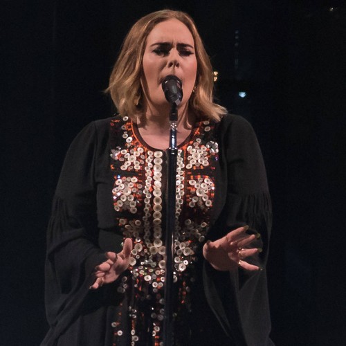 Adele's partner showers her with love note confetti at concert