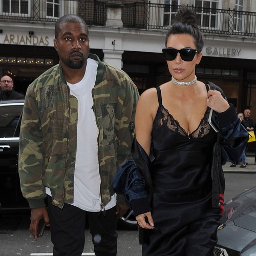 Kanye West takes family to visit mother's grave