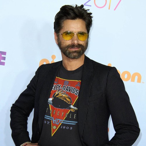 John Stamos splits his pants onstage with The Beach Boys