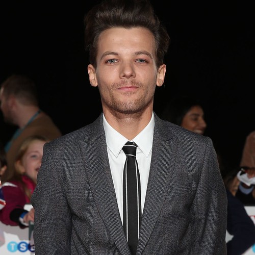Louis Tomlinson's battery hearing delayed