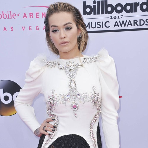 Rita Ora hopes new music will quiet interest in her love life
