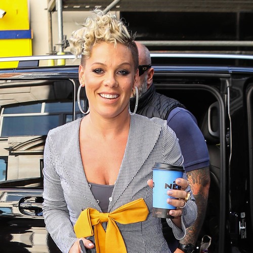 Pink jumps off crane for V Festival entrance