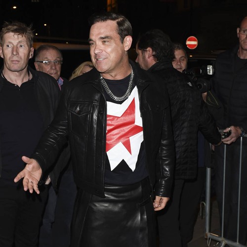 Drug-addled Robbie Williams 'clucked like a chicken' on first date with Ayda Field