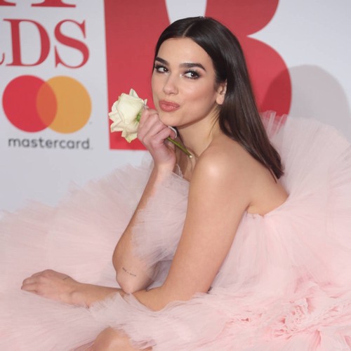 Dua Lipa shows her support for sex abuse victims with white rose at the Brit Awards