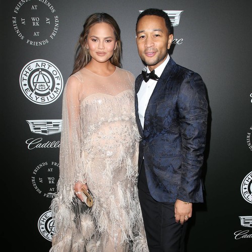 Chrissy Teigen and John Legend mourning death of first dog