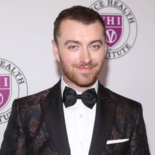 Sam Smith cringes at 'joke' smooch photos