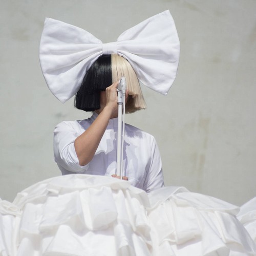 Sia designs limited capsule shoe collection to match her stage hair