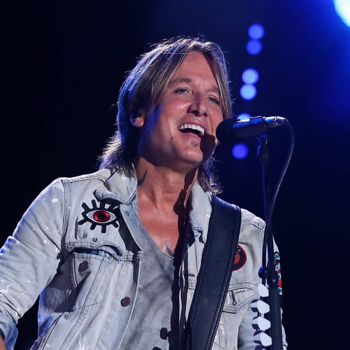 Keith Urban surprises critically ill superfan with hospital visit