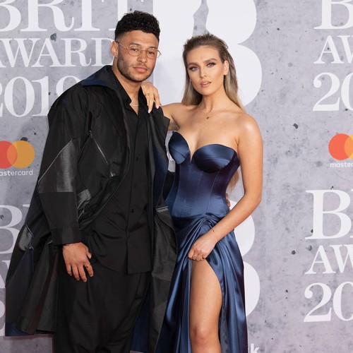 Perrie Edwards laughs as her cat attacks her boyfriend