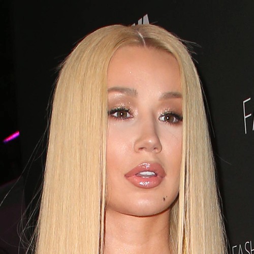 Iggy Azalea defends graphic album cover after fans call it 'sickening'