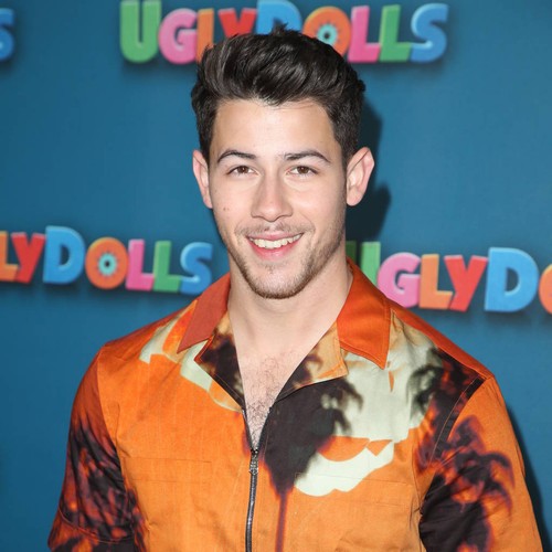Nick Jonas jokingly accepts Mariah Carey's invitation to start a band