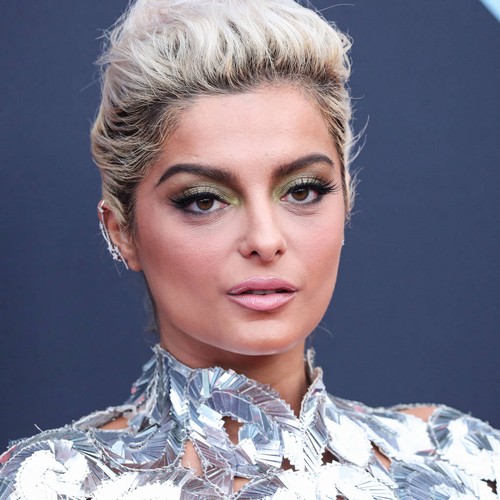 Bebe Rexha wants to time travel and tell younger self to relax