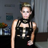 Miley Cyrus reacts to Jay-Z twerking lyric