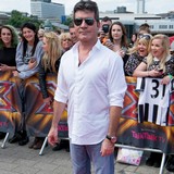 Cowell emotional over 1D's success