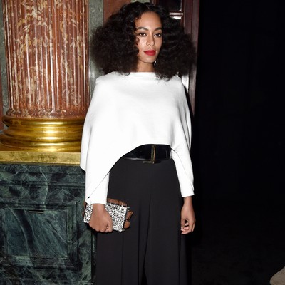 Solange 'by stabbed friend's bedside'