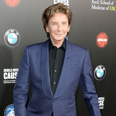 Manilow's ex wife wishes him happiness