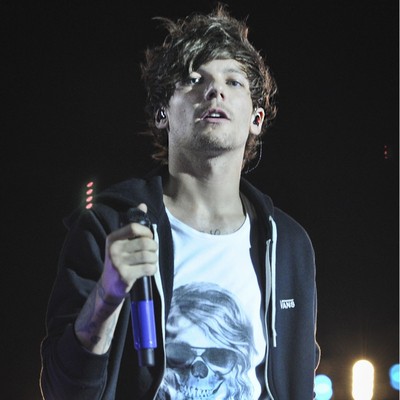 Louis Tomlinson 'jets to meet baby's grandmother'