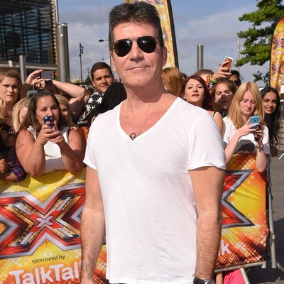 Simon Cowell: My son might speak dog!