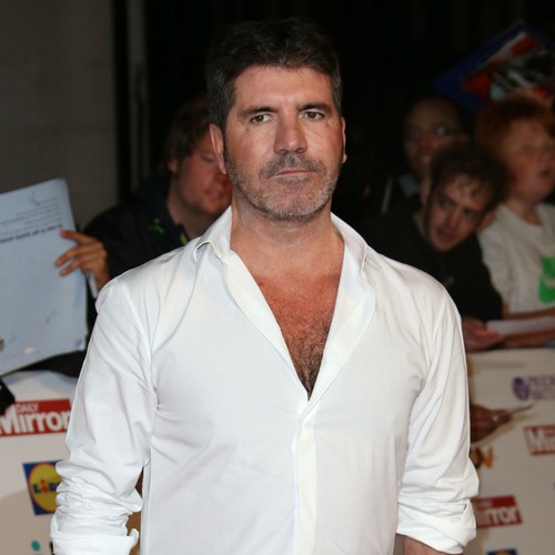 Simon Cowell cuts back on smoking for son