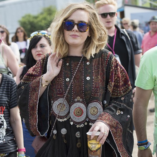 Adele 'soaking up the showbiz lifestyle'