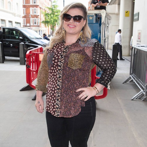 Pregnant Kelly Clarkson done having kids