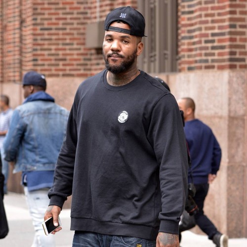 Rappers The Game and Snoop Dogg lead peace march