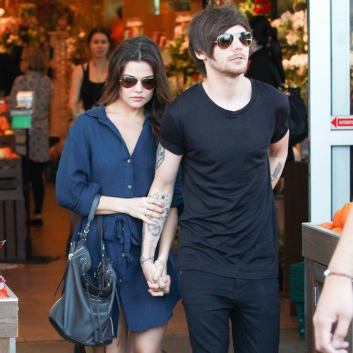 Louis Tomlinson's girlfriend coos about One Direction star's daddy skills