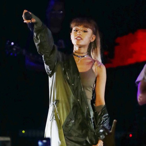Ariana Grande and Mac Miller 'seal romance rumours with a kiss'