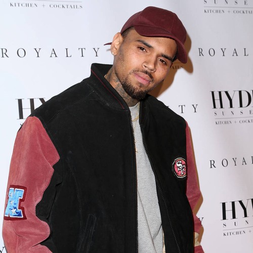 Authorities begin searching Chris Brown's home