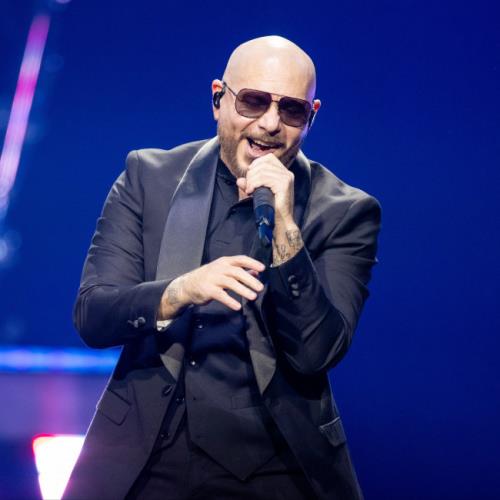 Pitbull says fans wearing bald caps to his concerts proves it’s ‘deeper than just music’