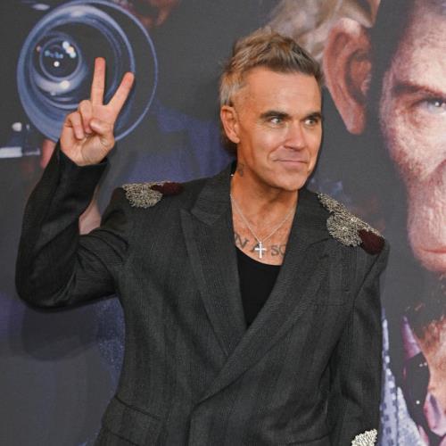 Robbie Williams signs with iconic 90s band’s management team and teases ‘new chapter’