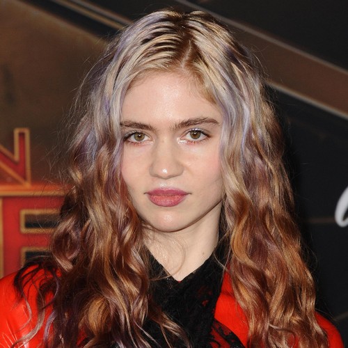 Grimes promises to deliver better set on Coachella weekend two